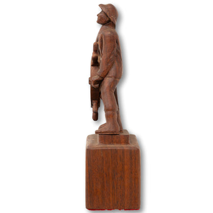 Signed Man at the Wheel Carving