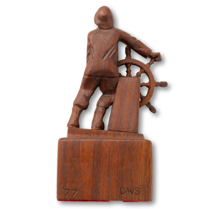 Signed Man at the Wheel Carving